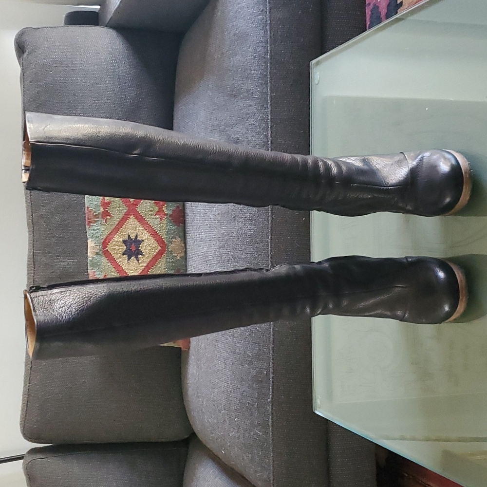 Coclico black pebbled leather boots